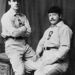 John McGraw and Wilbert Robinson sign contracts with the Baltimore Orioles of the National League