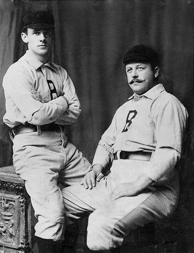 John McGraw and Wilbert Robinson sign contracts with the Baltimore Orioles of the National League