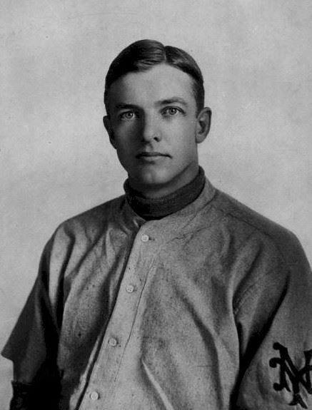 At a packed Washington Park, the Giants beat up Brooklyn, winning, 5 – 3 and 2 – 1, in a total of 23 innings. In the opener, Christy Mathewson relieves Bugs Raymond with the score knotted at 3 in the 9th. Matty shuts out the Superbas in the next six innings, and the Giants score two in the 14th off Harry McIntire for the win.