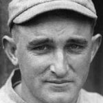 Carl Mays of the Red Sox wins two games, 12 - 0 and 4 - 1 over the A's to finish at 21-13 as the season is abbreviated because of World War I.