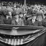 President Warren G. Harding, an avid baseball fan who likes to keep a scorecard at games, witnesses the first shutout ever thrown at Yankee Stadium. The chain-smoking Chief Executive is delighted to see Babe Ruth's fifth-inning homer off Allen Russell but is disappointed the Senators drop the contest, 4-0.