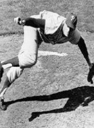 Jim Bunning, tossing a frame in relief, strikes out three batters on nine pitches