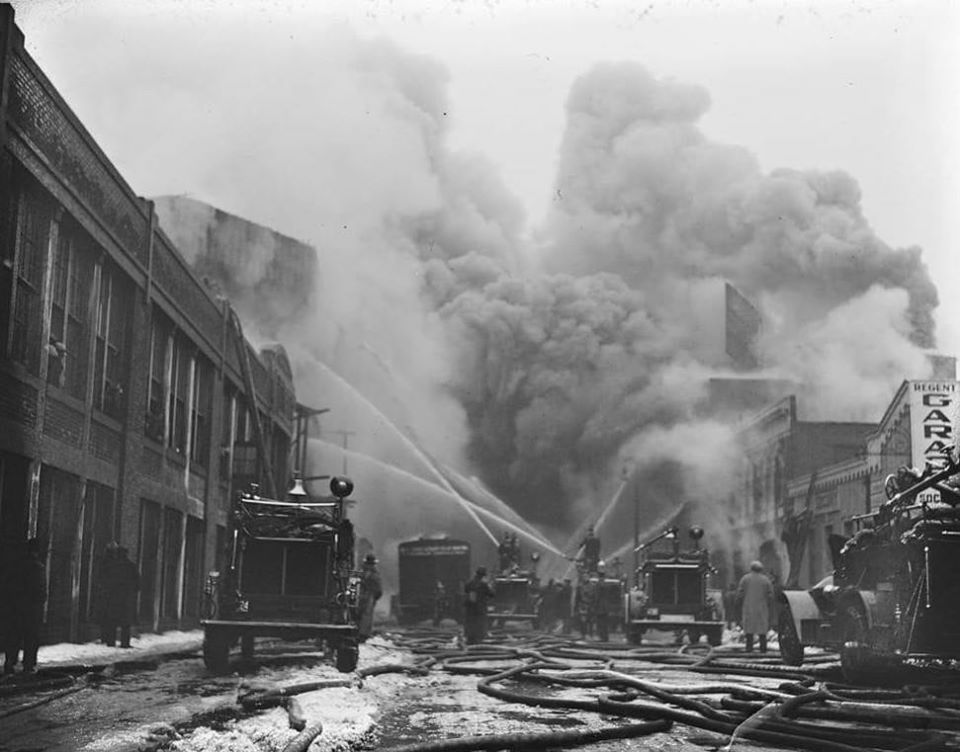 An early afternoon five-hour blaze destroys much of Fenway Park's newly-constructed left-field grandstand and center-field bleachers