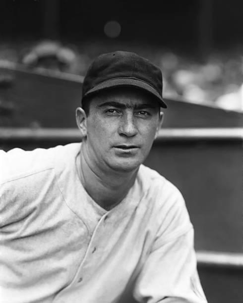 Washington Senators catcher Moe Berg sets an American League record by playing in his 117th consecutive game without an error