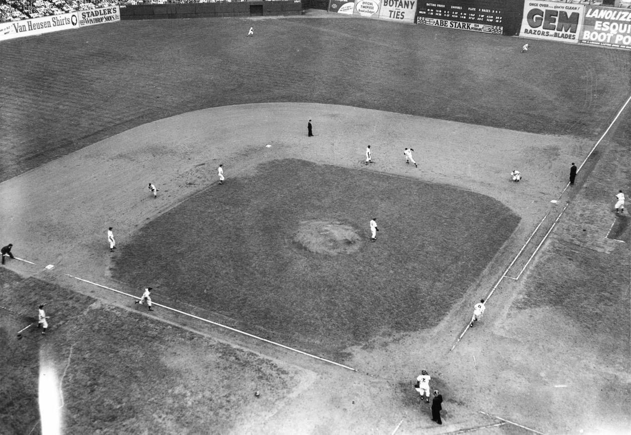 At Ebbets Field, the Dodgers sweep two from their cross-town rivals. In the first game, the Giants take a 4 - 2 lead in the 10th on Johnny Mize's 2-run home run, only to see Dolph Camilli hit reliever Harry Feldman's first pitch for a grand slam and give Dem Bums a 6 - 4 win. In the second game, the Dodgers score two in the 5th to take a 7 - 5 lead in a game halted by darkness. The Dodgers now lead St. Louis by 7 1/2 games.