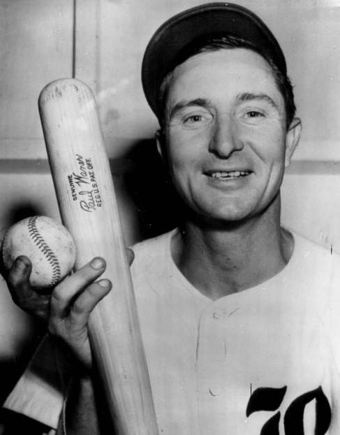 Paul Waner standing on first base, gestures to the official scorer, Jerry Moore of the Boston Globe, not to credit him with his 3000 hit