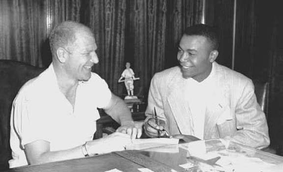 Larry Doby signs his first contract with Bill Veeck