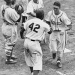 Jackie Robinson congratulates Stan Musial after his homerun in the 1949 All Star Game at Ebbets Field.