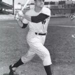 In a sloppy game that features 18 walks, Cliff Mapes drives in five runs with a homer and single to pace the Yankees to a 12 - 8 win over the Athletics. Tommy Byrne (9-3) is the winner despite giving up six hits and six walks in five innings (he walks two in the 6th). He also hits four batters to tie the major league record. Alex Kellner pitches four innings, giving up six runs in the loss. The A's lose Eddie Joost who tears ligaments in his left knee in a collision with Mapes at second base in the 7th.