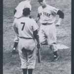 Mickey Mantle blasts the first home run of his career in an 8-3 victory