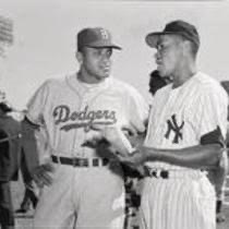 In the bottom of the second inning, Elston Howard, in his first World Series at-bat, knots the score at two to two when he homers off Dodgers’ right-hander Don Newcombe. The round-tripper to deep left field at Yankee Stadium marks the first time a black batter has hit a home run off a black pitcher in the history of the Fall Classic.