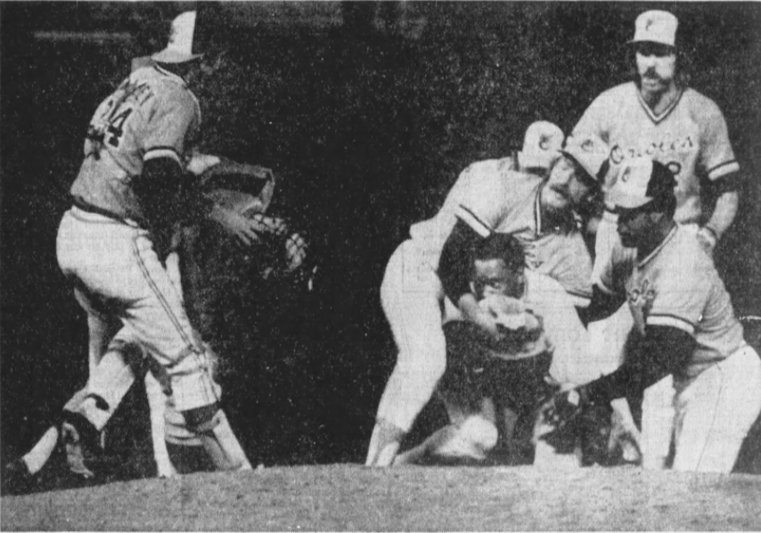 george scott charges the mound