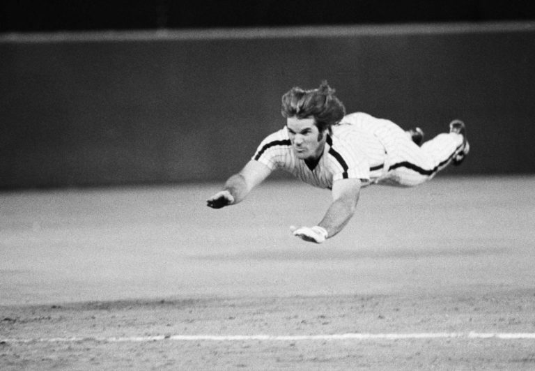 39-year-old Pete Rose steals second base, third, and home in one inning for the Phillies