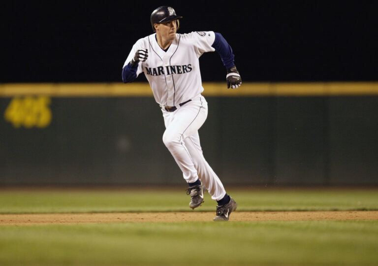 Dan Wilson hits the first inside-the-park grand slam in the history of the Mariners