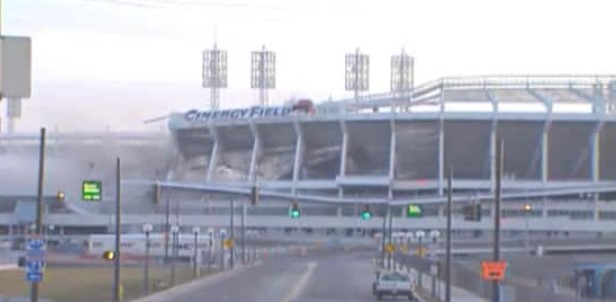 Three blocks away from the blast, thousands of spectators at Paul Brown Stadium cheer as 1,275 pounds of explosives implodes Cinergy Field, which was opened in 1970, sending a huge dust cloud down the Ohio River. The structure, formerly known as “Riverfront Stadium”, was the site where Hank Aaron tied Babe Ruth’s career 714 home run record on Opening Day in 1974, and Pete Rose broke Ty Cobb’s all-time 4,189 hits record in 1985. The site will become the western concourse of Great American Ball Park and will include the Cincinnati Reds Hall of Fame when it opens in the 2004 season.