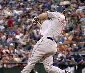 Cleveland rookie Kevin Kouzmanoff hits a grand slam in his first major league at-bat, on the first pitch