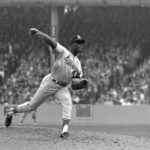 Bob Gibson wins his 11th straight victory to break the Cardinal record