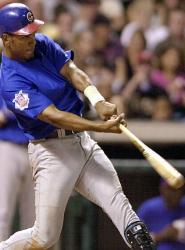 Moises Alou (.331, 27, 108) signs a $27 million, three-year deal with the Cubs