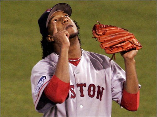 Seven months before a November deadline, the Boston Red Sox exercise their 2004 contract option on Pedro Martinez