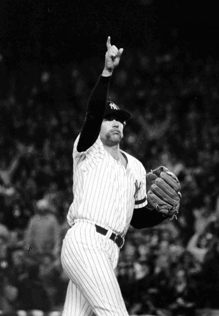 Rich Gossage and Cliff Johnson of the New York Yankees brawl in the clubhouse after a 6 – 3 loss