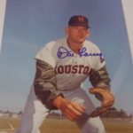 Don Larsen tosses a five-hitter in the Texas heat to best Warren Spahn It is Larsen's first complete game in five years.