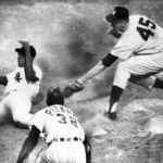 Minnie Minoso scores on pass ball to 6-1 win