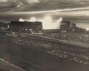 Cleveland Municipal Stadium, June 30, 1950 - A stunning photo of this enormous ballpark taken during a night game between the Detroit Tigers and Cleveland Indians. 50,882 were on hand to see the Tribe in a 11-3 romp with slugger Luke Easter hitting two home runs and driving in four runs.  The Tigers ace Hal Newhouser only lasted one inning giving up five earned runs on six hits. After winning 136 games the previous six seasons, Newhouser would struggle in 1950 going 15-13 and a hefty 4.34 ERA.  Mike Garcia took the mound for Cleveland and despite struggling some he did get the complete game win to improve his record to 6-4 on the season. The California native gave up just five hits but walked seven Tigers batters