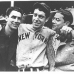 The brothers Joe, Vince and Dom DiMaggio play together for the first time, making up an outfield for an All-Star team in a West Coast charity game.