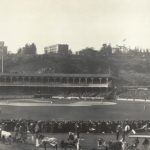 Just two and a half months after a fire destroyed the old Polo Grounds, the new grounds open for business. The old bleachers, seating 10,000, were untouched, but the new double-decker grandstand seats another 16,000. Only 6,000 fans show up for the inauguration as Christy Mathewson shuts out the Rustlers, 3 - 0, on nine hits. On the front end of a double steal, Mathewson swipes home in the 4th inning. While guests at the Highlanders' Hilltop Park, the Giants won 21 of 29 games.