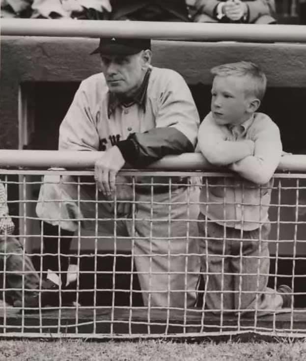 Leo Durocher & son stare intently at the action during 1955 spring training