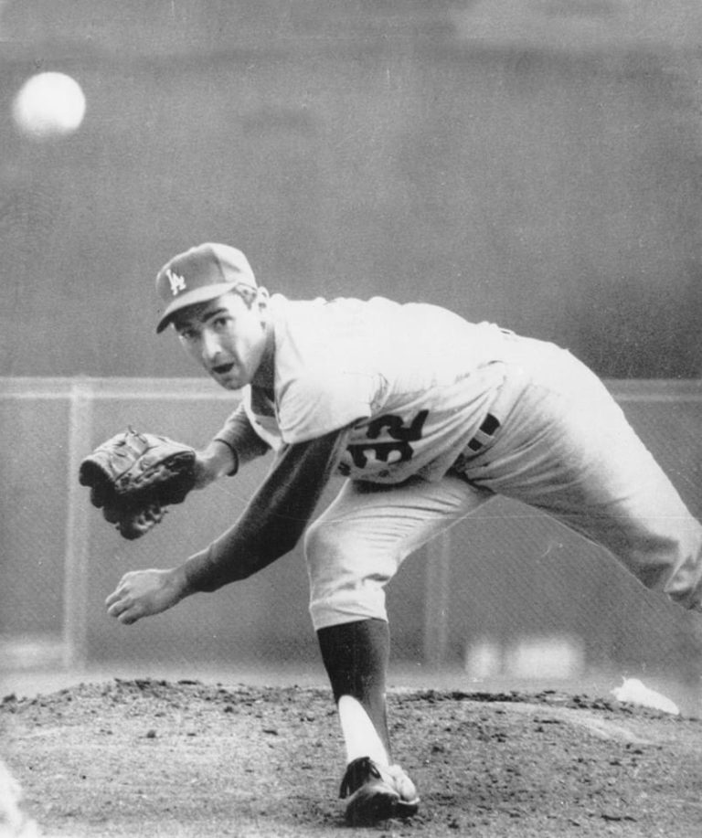 Sandy Koufax sets a National League record for strikeouts in a season: 269