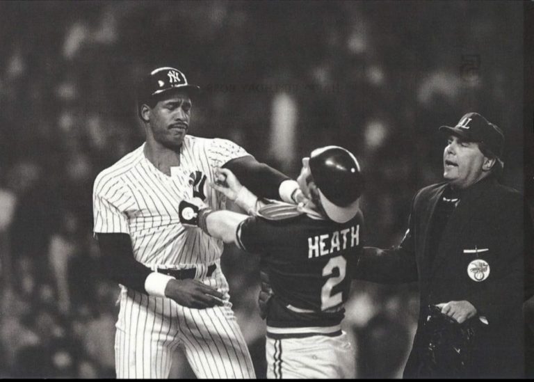 Dave Winfield grabs Oakland A’s catcher Mike Heath by the throat at Yankee Stadium