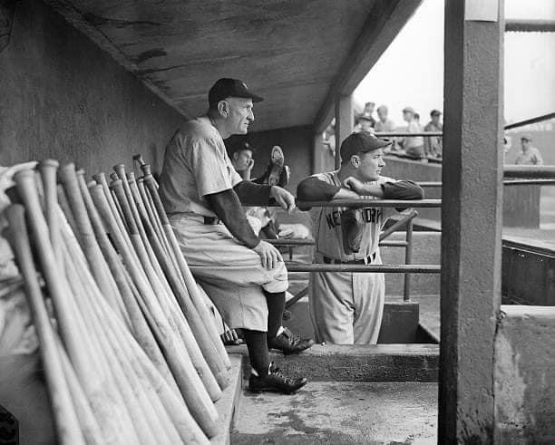 1949—first year Yankees manager Casey Stengel and relief ace Joe Page.