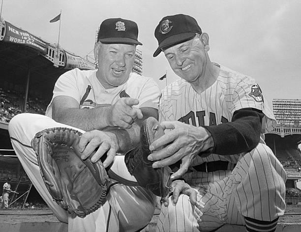 Dizzy Dean (L) points out to Earl Averill, toe that liner off the bat of Averill broke during 1937 All-Star game