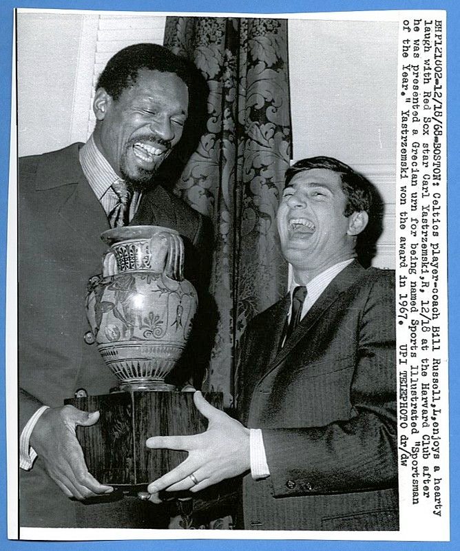 Bill Russell and Carl Yastrzemski share a laugh after Russell won Sport Illustrated Sportsman of the Year in 1968, Yaz won the award in 1967