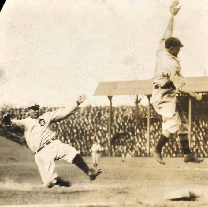 Ty Cobb steals third base against St Louis Browns at Sportsman Park, October 2, 1908.