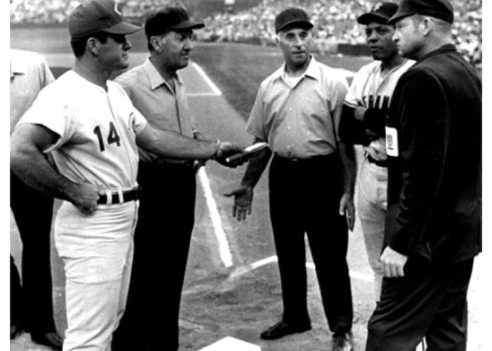 PeteRose turns in the final lineup card for the final game at Crosley Field. June 24, 1970. Willie Mays San Francisco Giants captain stands by