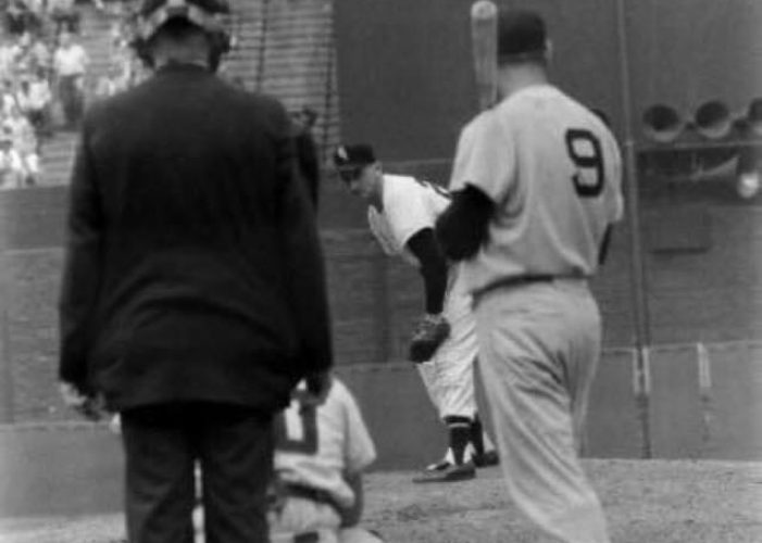 Boston Red Sox Star Ted Williams stares down White Sox pitcher Dick Donovan in the third inning during a game at Comiskey Park on July 25, 1958. Sherm Lollar is behind the plate and the home plate umpire is Bill Summers. Donovan will record a rare strikeout of the “Splendid Splinter” as the White Sox will be victorious by a 4-0 score.