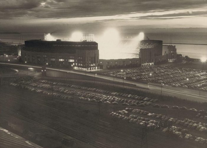 Cleveland Municipal Stadium, June 30, 1950 - A stunning photo of this enormous ballpark taken during a night game between the Detroit Tigers and Cleveland Indians. 50,882 were on hand to see the Tribe in a 11-3 romp with slugger Luke Easter hitting two home runs and driving in four runs. The Tigers ace Hal Newhouser only lasted one inning giving up five earned runs on six hits. After winning 136 games the previous six seasons, Newhouser would struggle in 1950 going 15-13 and a hefty 4.34 ERA. Mike Garcia took the mound for Cleveland and despite struggling some he did get the complete game win to improve his record to 6-4 on the season. The California native gave up just five hits but walked seven Tigers batters