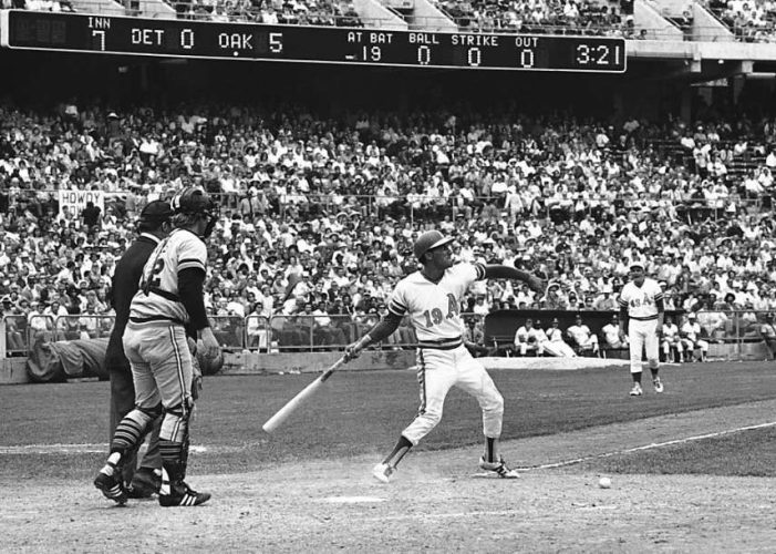 Oakland's Campy Campaneris hurling his bat at Tigers' pitcher Lerrin LaGrow after taking a fastball in the ankle during the 1972 American League playoffs.