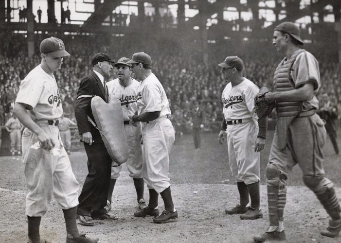 7 May 1941: Dolph Camilli and manager Leo Durocher argue a close play at the plate. That's Pee Wee Reese on the left, Paul Waner on the right, and Cardinals' catcher Walker Cooper listening in.