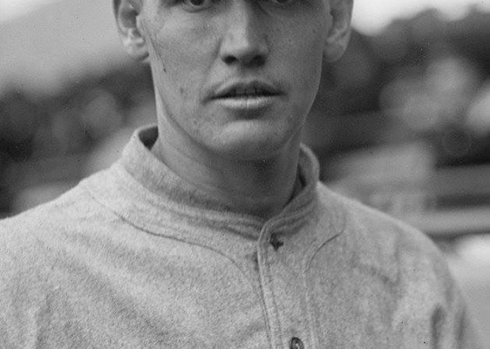 August 6, 1912 - At Cleveland, Joe Wood gives up 13 hits in an 11-inning 5 - 4 win for Boston. He strikes out five in running his record to 23-4.
