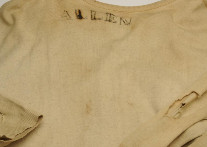 Bill_McGowan_orders_Cleveland_pitcher_Johnny_Allen_to_trim_off_the_tattered_sleeves_of_his_undershirt_because_they_distract_opposing_batters