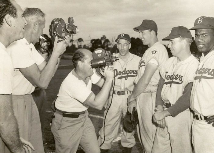 Billy Cox, Gil Hodges, Pee Wee Reese and Jackie Robinson pose for the media during Spring Training, 1952