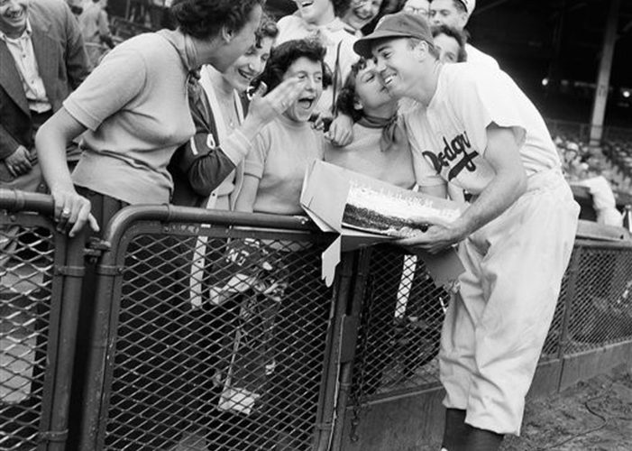 Duke Snider gets a cake and a kiss on his 24th birthday in September 1950. Said Carl Furillo, "It seemed the whole team belonged to Brooklyn."