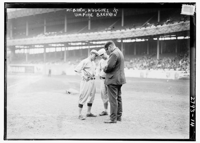 Managers_John_McGraw,_New_York_NL,_and_Miller_Huggins,_St._Louis_NL,_with_umpire_William_T.__Bill__Brennan_(LOC)