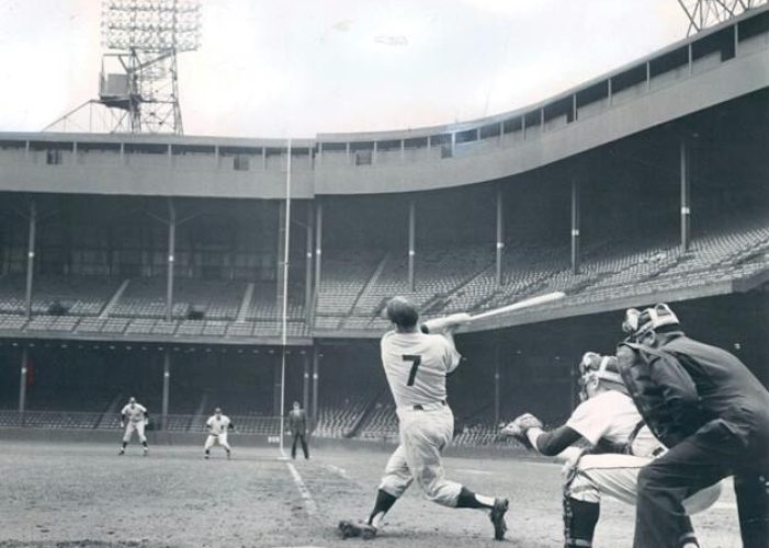 Mickey Mantle poles a Jim Bunning pitch down the right field line