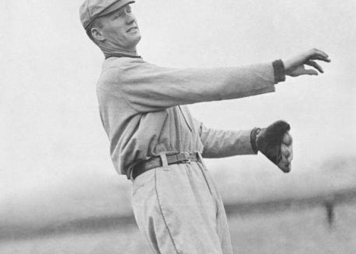 Senator hurler Walter Johnson wins his first major league game beating the Naps